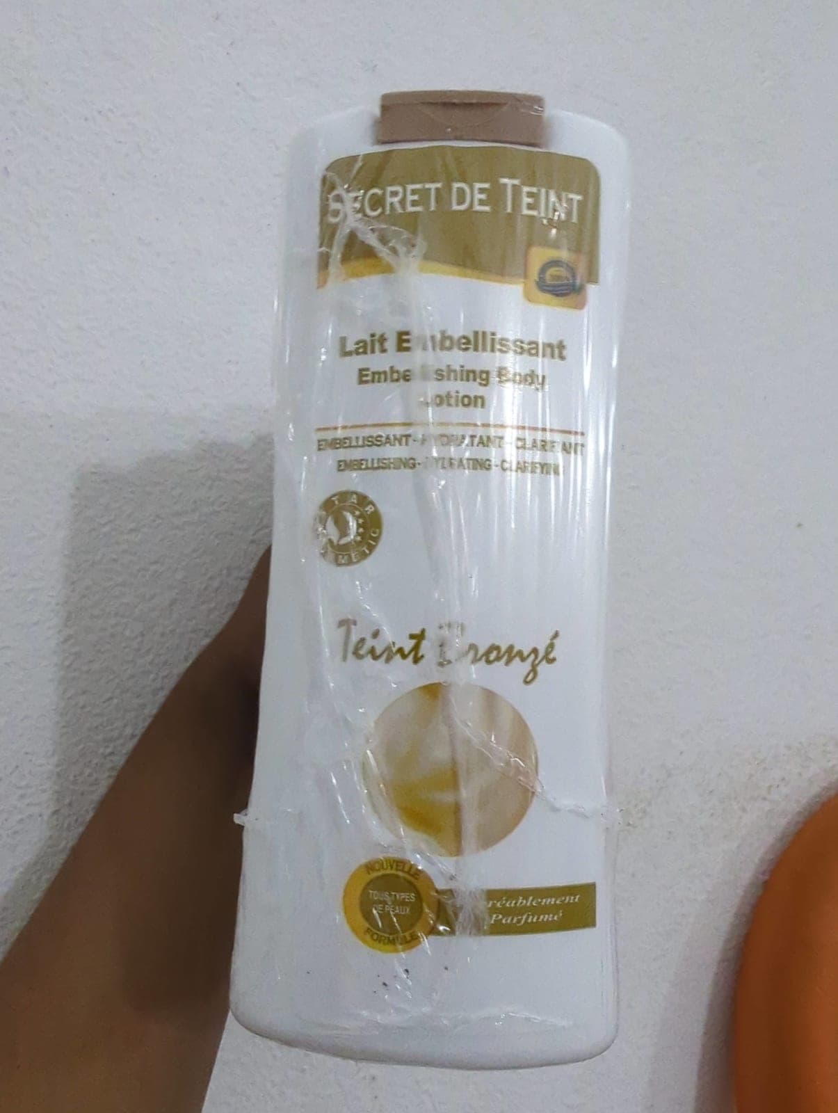 Lait secret de teint marron